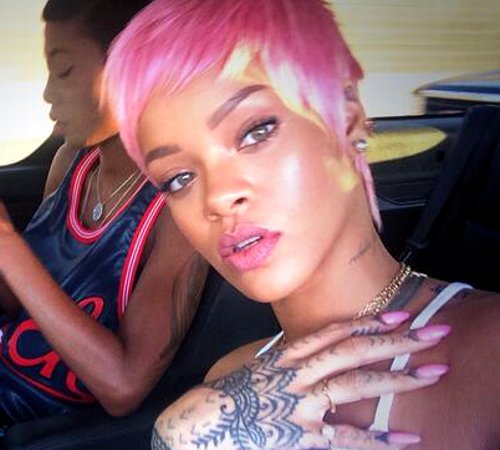 Rihanna Rocks Pink Pixie Wig To Clippers Game