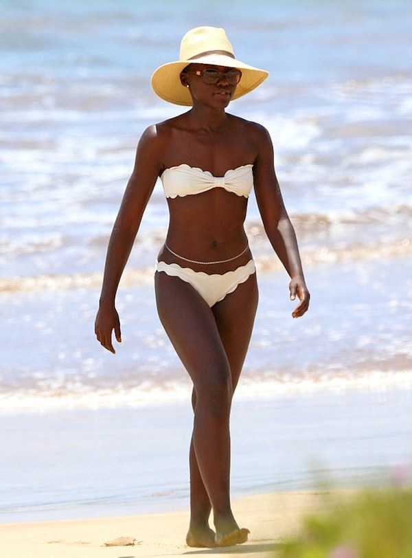 Lupita Nyong’o Looks Chic In All White Marysia Scallop Bikini