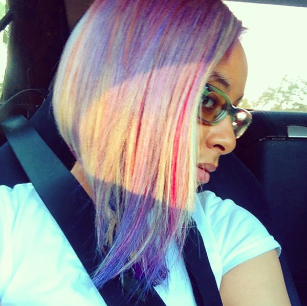 Raven Symone Shows Off Pastel Purple and Grey Bob Hairstyle