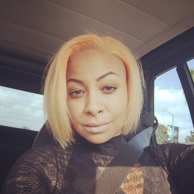 Raven-Symoné Shows Off New Peach Hair Color For the Holidays